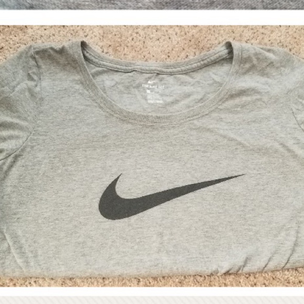a black and grey nike tee